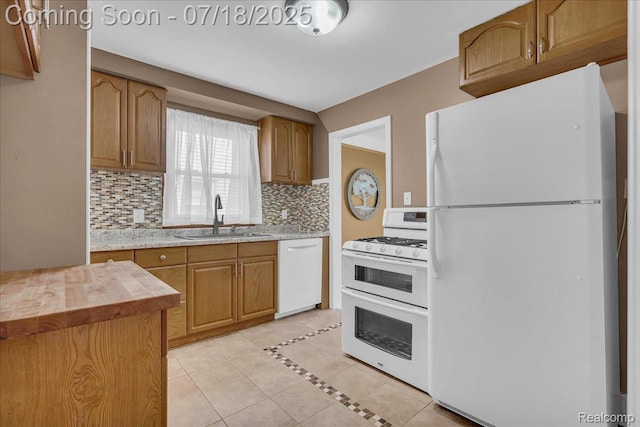 24429 Notre Dame St, Dearborn, MI 48124 - kitchen featuring white appliances, light tile patterned floors, tasteful backsplash, brown cabinetry, and wood counters