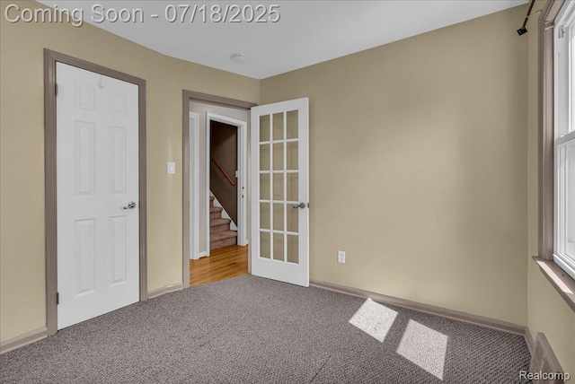 24429 Notre Dame St, Dearborn, MI 48124 - carpeted empty room with baseboards and a smoke detector