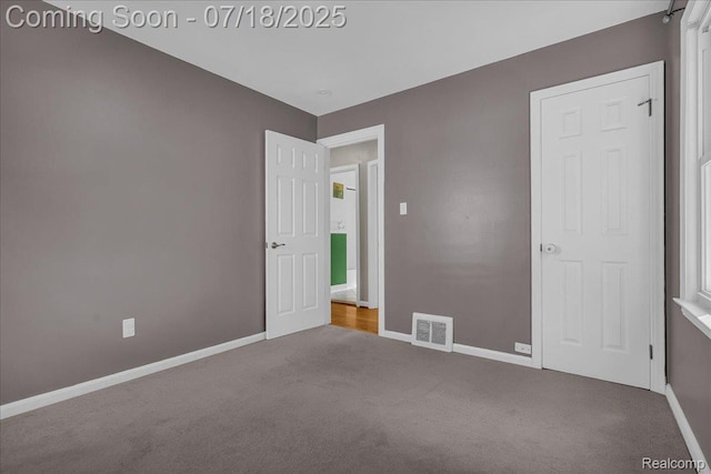 24429 Notre Dame St, Dearborn, MI 48124 - unfurnished bedroom featuring carpet flooring and baseboards