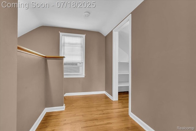 24429 Notre Dame St, Dearborn, MI 48124 - hallway with vaulted ceiling, wood finished floors, and cooling unit