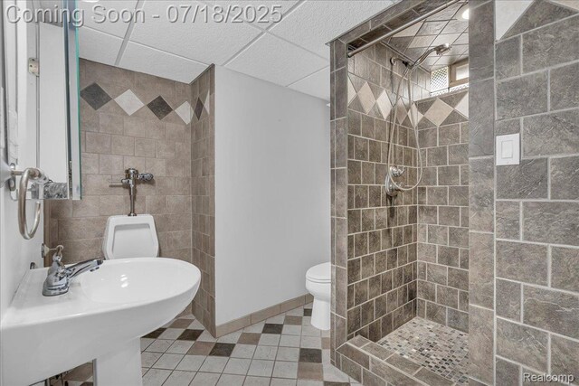 24429 Notre Dame St, Dearborn, MI 48124 - bathroom with tiled shower and tile patterned flooring