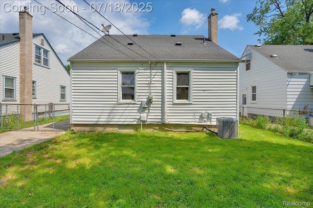 24429 Notre Dame St, Dearborn, MI 48124 - back of house featuring a chimney and roof with shingles