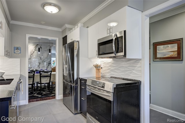 1470 Timberview Trl, Bloomfield Hills, MI 48304 - kitchen featuring appliances with stainless steel finishes, white cabinetry, backsplash, light tile patterned floors, and ornamental molding