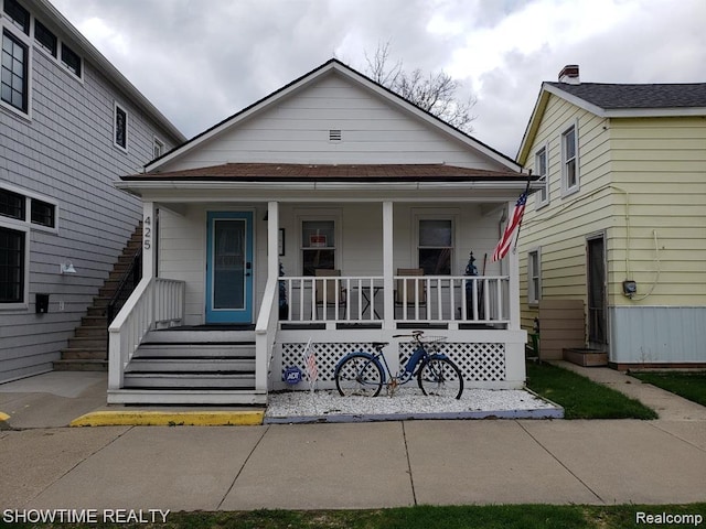 425 Broadway St, Marine City, MI 48039 - view of front facade featuring covered porch