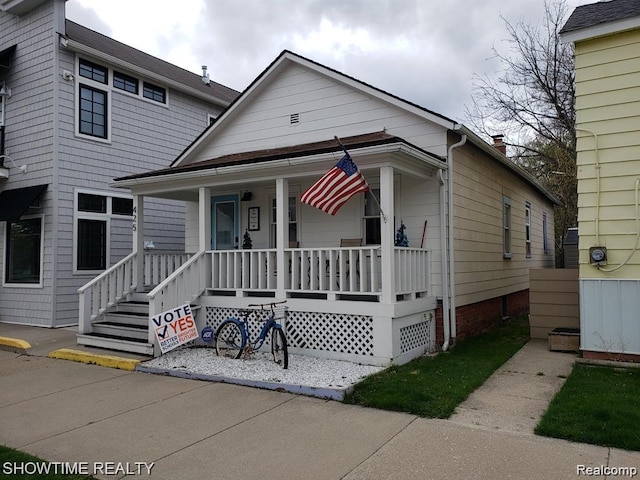425 Broadway St, Marine City, MI 48039 - view of front of property with a porch