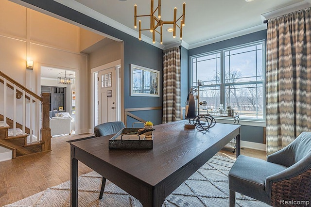 58672 Losino Dr, South Lyon, MI 48178 - home office featuring a chandelier, plenty of natural light, wood finished floors, and crown molding
