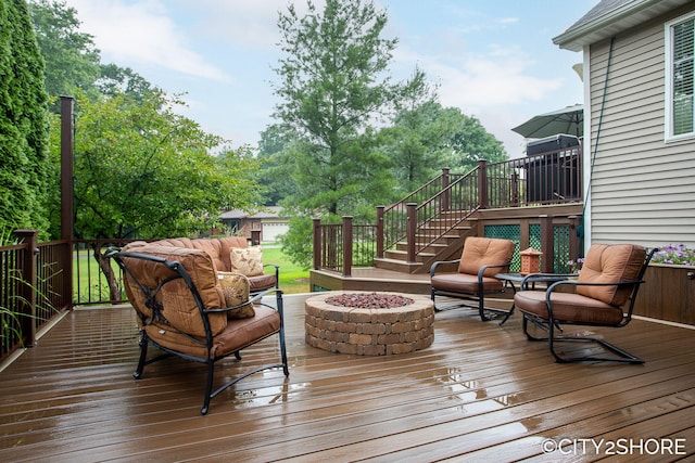 3981 Acadia Dr, Hudsonville, MI 49426 - wooden deck with stairs and an outdoor living space with a fire pit