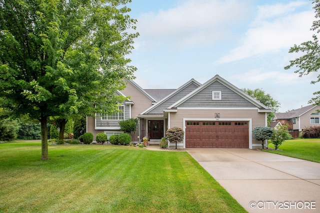 3981 Acadia Dr, Hudsonville, MI 49426 - craftsman inspired home with a garage, a front yard, and driveway