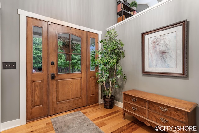 3981 Acadia Dr, Hudsonville, MI 49426 - foyer with wood finished floors and baseboards