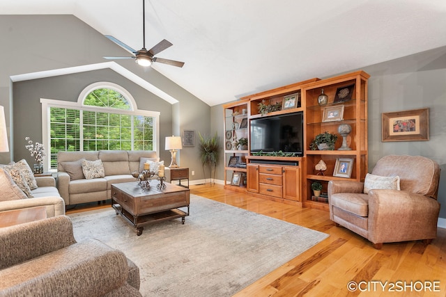 3981 Acadia Dr, Hudsonville, MI 49426 - living area featuring light wood-type flooring, ceiling fan, and lofted ceiling