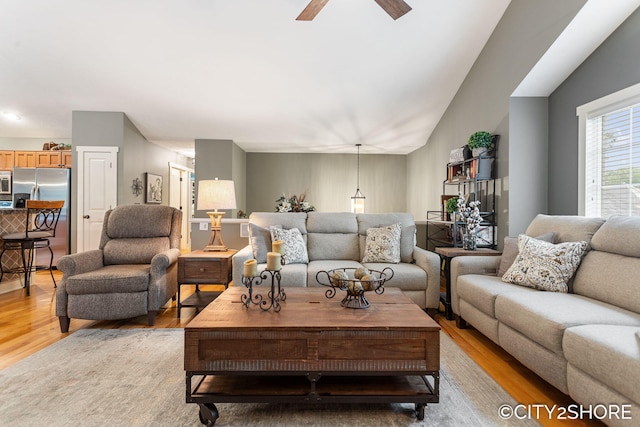 3981 Acadia Dr, Hudsonville, MI 49426 - living room with light wood finished floors and a ceiling fan