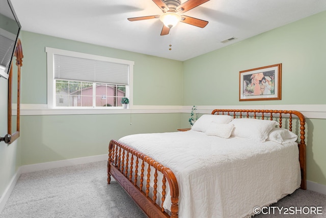 3981 Acadia Dr, Hudsonville, MI 49426 - carpeted bedroom with baseboards and ceiling fan