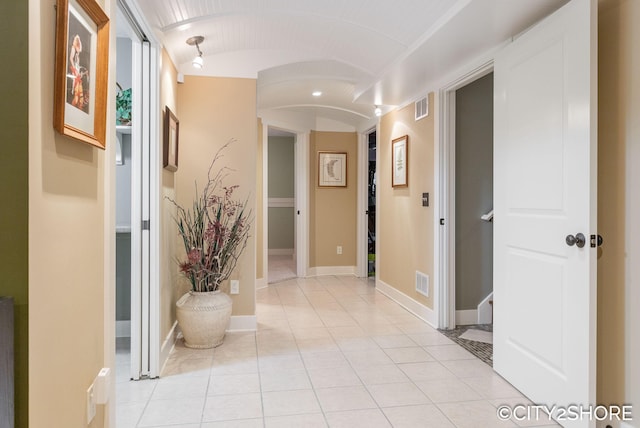 3981 Acadia Dr, Hudsonville, MI 49426 - corridor with light tile patterned floors and arched walkways