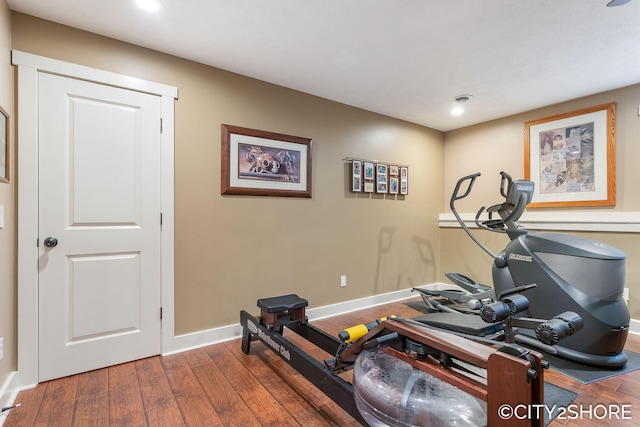 3981 Acadia Dr, Hudsonville, MI 49426 - workout room featuring dark wood-type flooring and recessed lighting