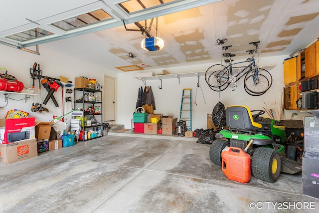 3981 Acadia Dr, Hudsonville, MI 49426 - garage featuring a garage door opener