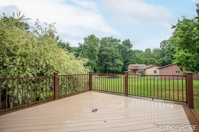 3981 Acadia Dr, Hudsonville, MI 49426 - wooden deck with a lawn