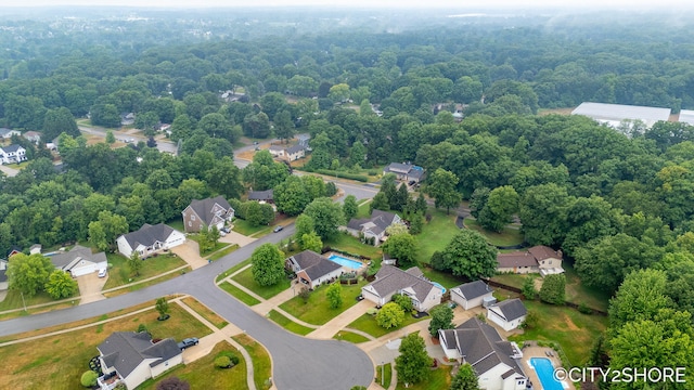 3981 Acadia Dr, Hudsonville, MI 49426 - aerial perspective of suburban area featuring a heavily wooded area