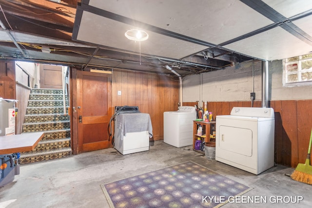 747 State St, Holland, MI 49423 - below grade area with independent washer and dryer, wood walls, and stairs