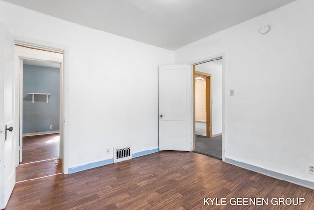 747 State St, Holland, MI 49423 - spare room with wood finished floors and a smoke detector