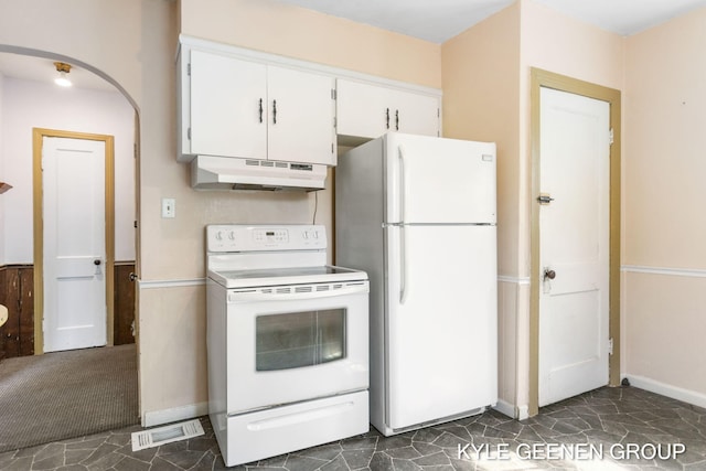 747 State St, Holland, MI 49423 - kitchen with white appliances, under cabinet range hood, and white cabinets