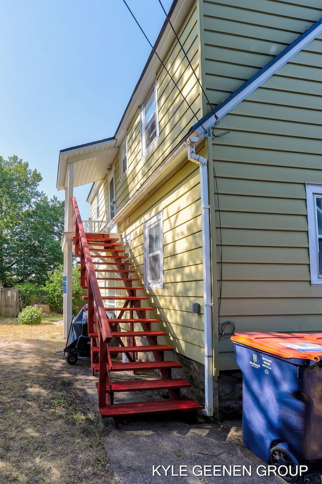 747 State St, Holland, MI 49423 - view of side of home with stairway