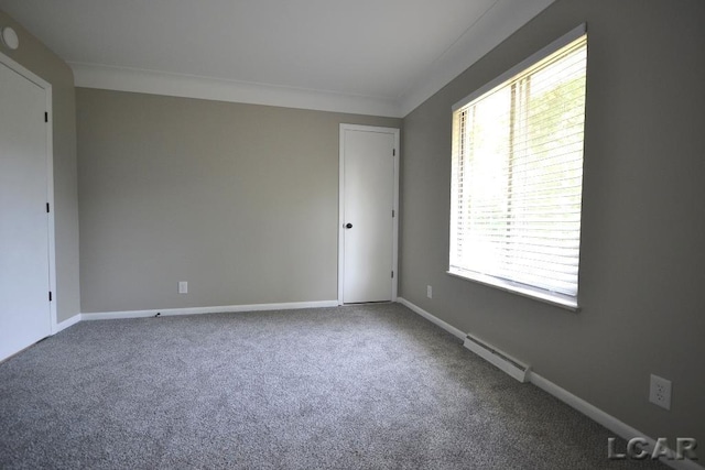 304 N Van Buren St, Tecumseh, MI 49286 - unfurnished room featuring carpet floors and crown molding
