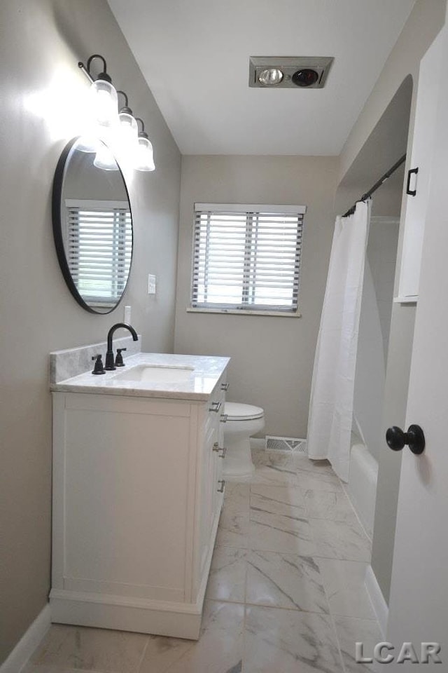 304 N Van Buren St, Tecumseh, MI 49286 - bathroom with vanity, marble finish floors, and shower / bathtub combination with curtain