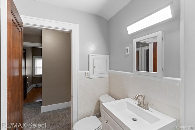619 Frank St, Flint, MI 48504 - bathroom featuring vanity and tile walls