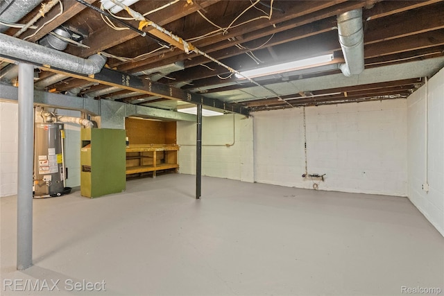 619 Frank St, Flint, MI 48504 - unfinished below grade area with gas water heater and heating unit