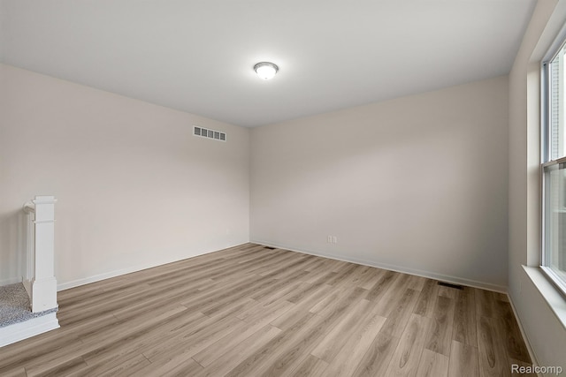 21008 Campolina Dr, South Lyon, MI 48178 - unfurnished room featuring light wood-style floors and baseboards
