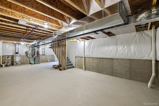 21008 Campolina Dr, South Lyon, MI 48178 - unfinished below grade area with gas water heater, electric panel, stairway, and heating unit
