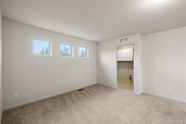 21008 Campolina Dr, South Lyon, MI 48178 - spare room with baseboards and light carpet