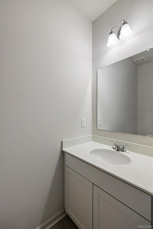 21008 Campolina Dr, South Lyon, MI 48178 - bathroom with vanity and wood finished floors