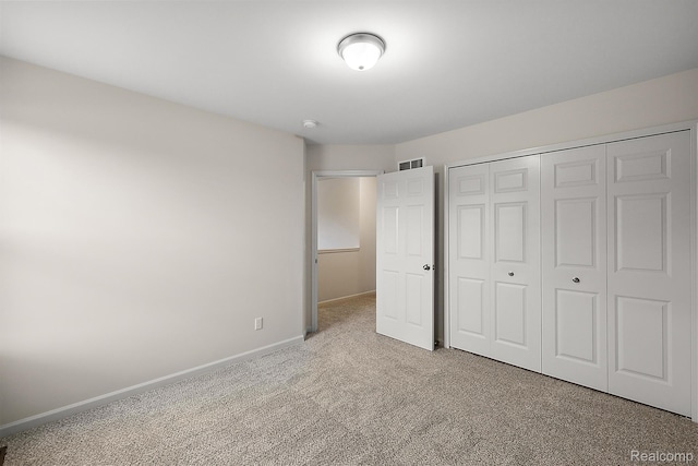 21008 Campolina Dr, South Lyon, MI 48178 - unfurnished bedroom with carpet flooring and a closet