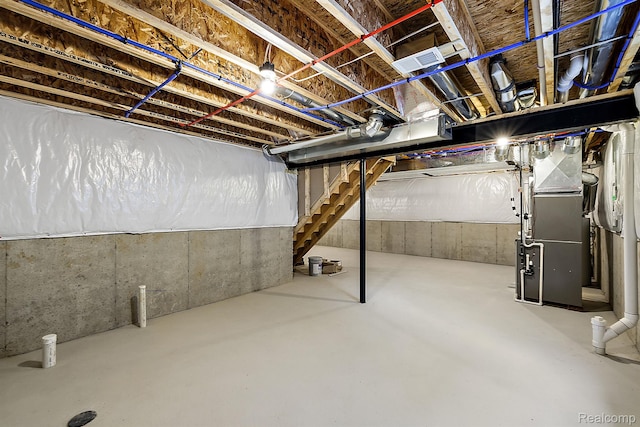 21008 Campolina Dr, South Lyon, MI 48178 - unfinished below grade area with stairs and heating unit