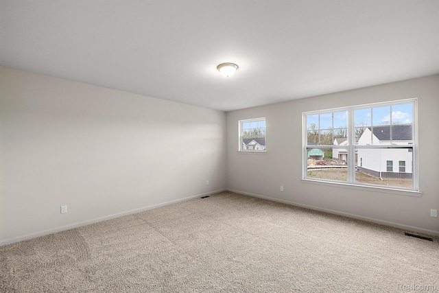 21008 Campolina Dr, South Lyon, MI 48178 - carpeted spare room featuring baseboards