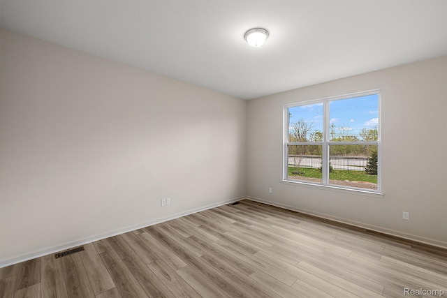 21008 Campolina Dr, South Lyon, MI 48178 - spare room with light wood-style floors