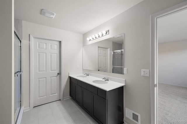 21008 Campolina Dr, South Lyon, MI 48178 - full bath featuring double vanity and a shower with door