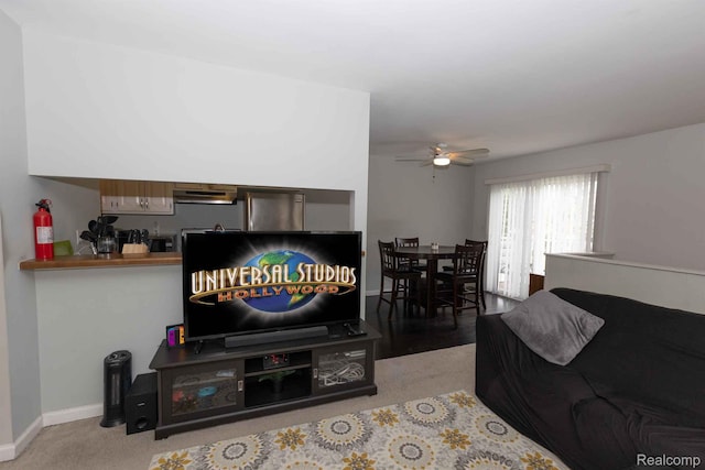 3091 Oakridge Ct, Lake Orion, MI 48360 - living area featuring ceiling fan and carpet