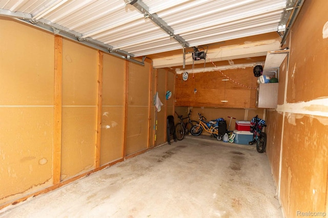 3091 Oakridge Ct, Lake Orion, MI 48360 - garage with a garage door opener