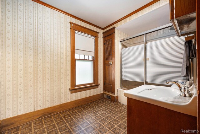 1615 W Genesee St, Lapeer, MI 48446 - bathroom with ornamental molding and vanity