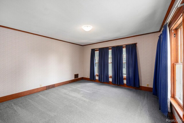 1615 W Genesee St, Lapeer, MI 48446 - unfurnished room with crown molding, plenty of natural light, and carpet flooring