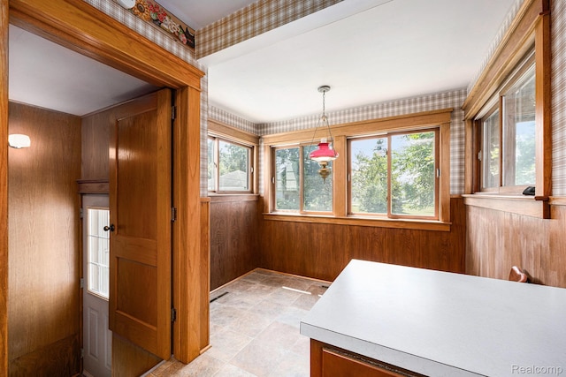 1615 W Genesee St, Lapeer, MI 48446 - dining space with healthy amount of natural light and wooden walls