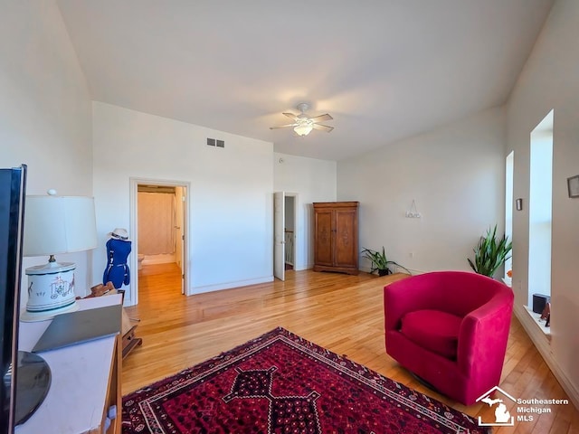 8 E Front St, Monroe, MI 48161 - living area featuring wood finished floors and ceiling fan