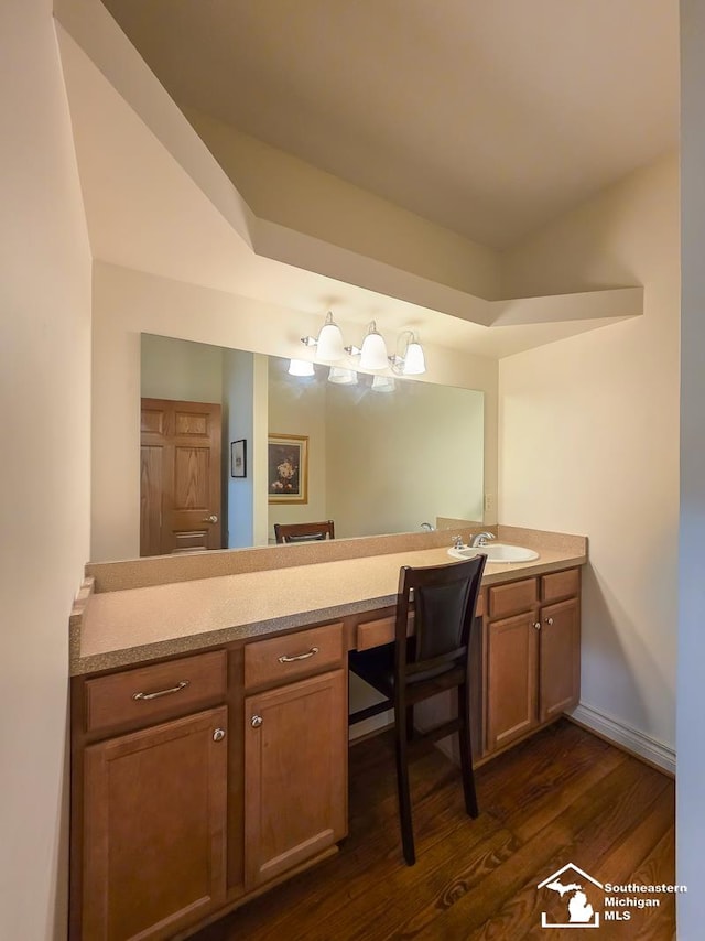 8 E Front St, Monroe, MI 48161 - bathroom with double vanity and wood finished floors