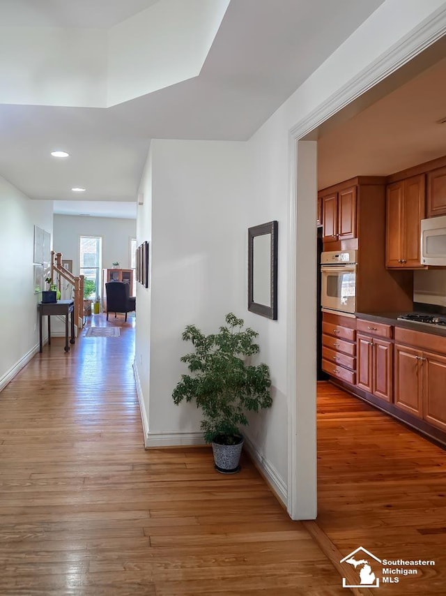 8 E Front St, Monroe, MI 48161 - hall featuring light wood finished floors and recessed lighting