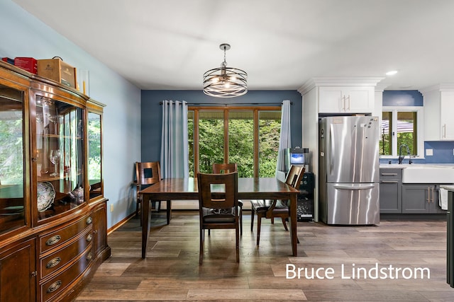 15520 157th Ave, Big Rapids, MI 49307 - dining space with dark wood finished floors, recessed lighting, and a chandelier