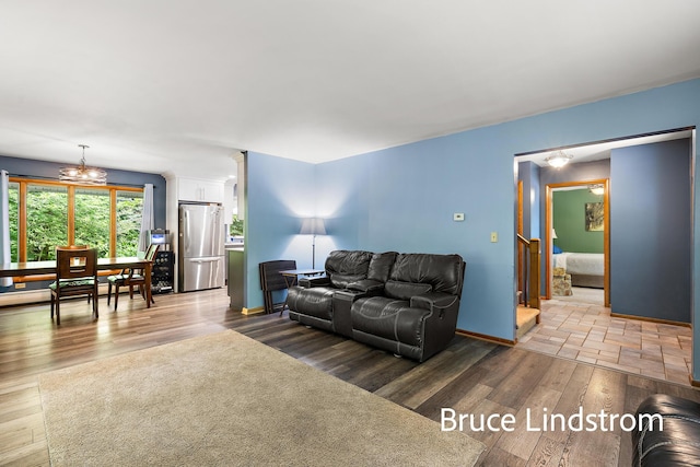 15520 157th Ave, Big Rapids, MI 49307 - living room featuring wood finished floors and stairs
