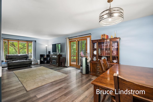 15520 157th Ave, Big Rapids, MI 49307 - dining space featuring healthy amount of natural light, wood finished floors, and a chandelier