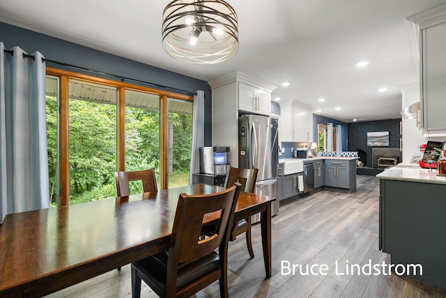 15520 157th Ave, Big Rapids, MI 49307 - dining area featuring recessed lighting, light wood-type flooring, and a chandelier